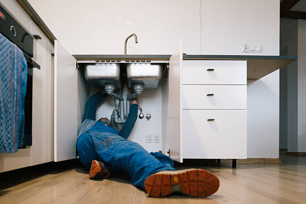 Professional Drain Cleaning technician working in Arlington, VA